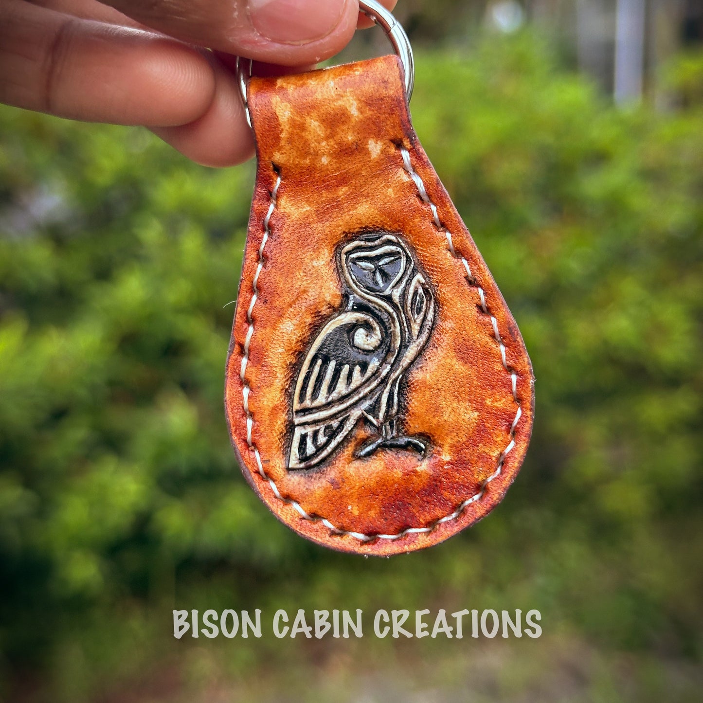 Hand-tooled leather keychain with a Celtic owl