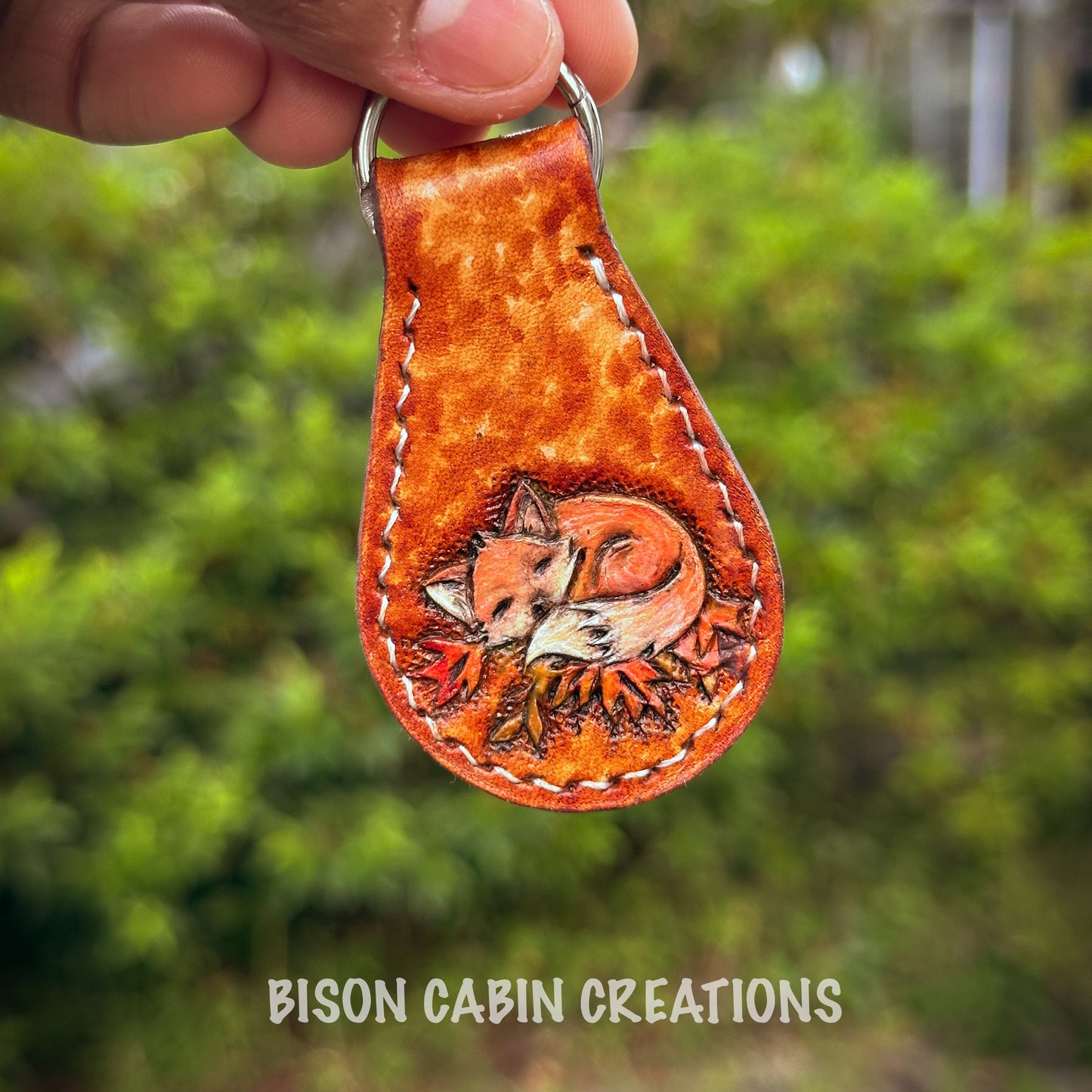 Hand-made, tooled leather keychain featuring Mushroom, rustic hand-painted details with medium brown leather, and nature-inspired key fob.