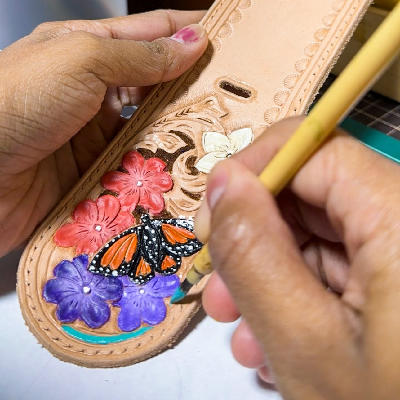 painting a western floral and monarch  butterfly design 