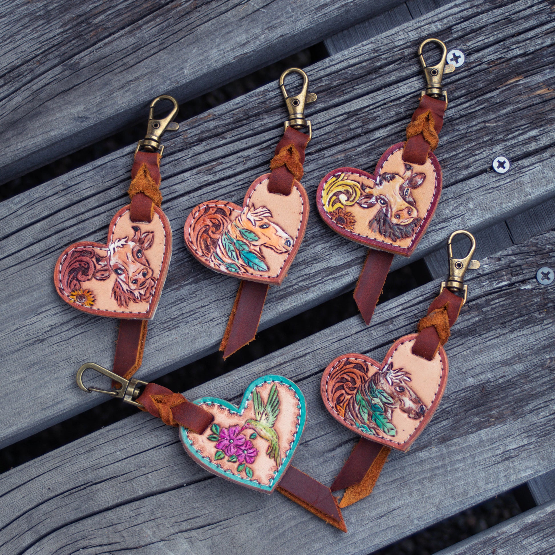  handcrafted, tooled leather heart charm, horse and cow  designed  