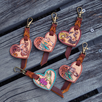  handcrafted, tooled leather heart charm, horse and cow  designed  