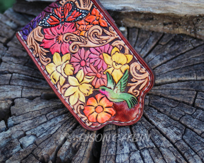 Artistic tooled leather AirPods holder decorated with vibrant blossoms, swirling patterns, Butterfly and sparrow bird details.