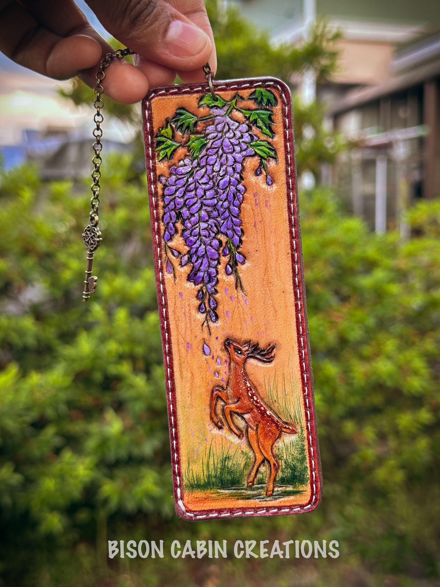 Handmade leather keychain with wisteria and deer design, leather carved bookmark