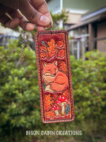 Handmade leather keychain with a fox design, and a tooled Leather bookmark.