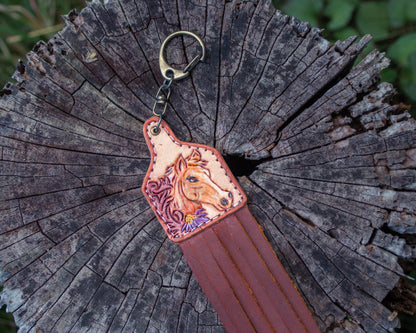 Handcrafted tooled leather horse keychain with rustic Western design and detailed hand carved leather artwork
